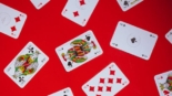 free-photo-of-photograph-of-playing-cards-on-a-red-surface