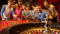 Four aces and gambling chips on the table.